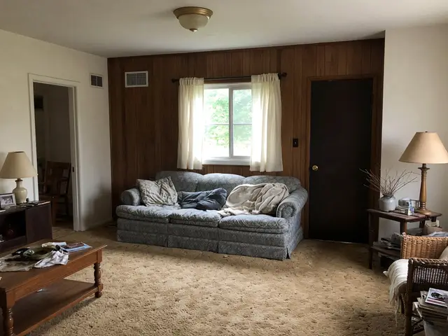 Dated living room in a house sold as-is
